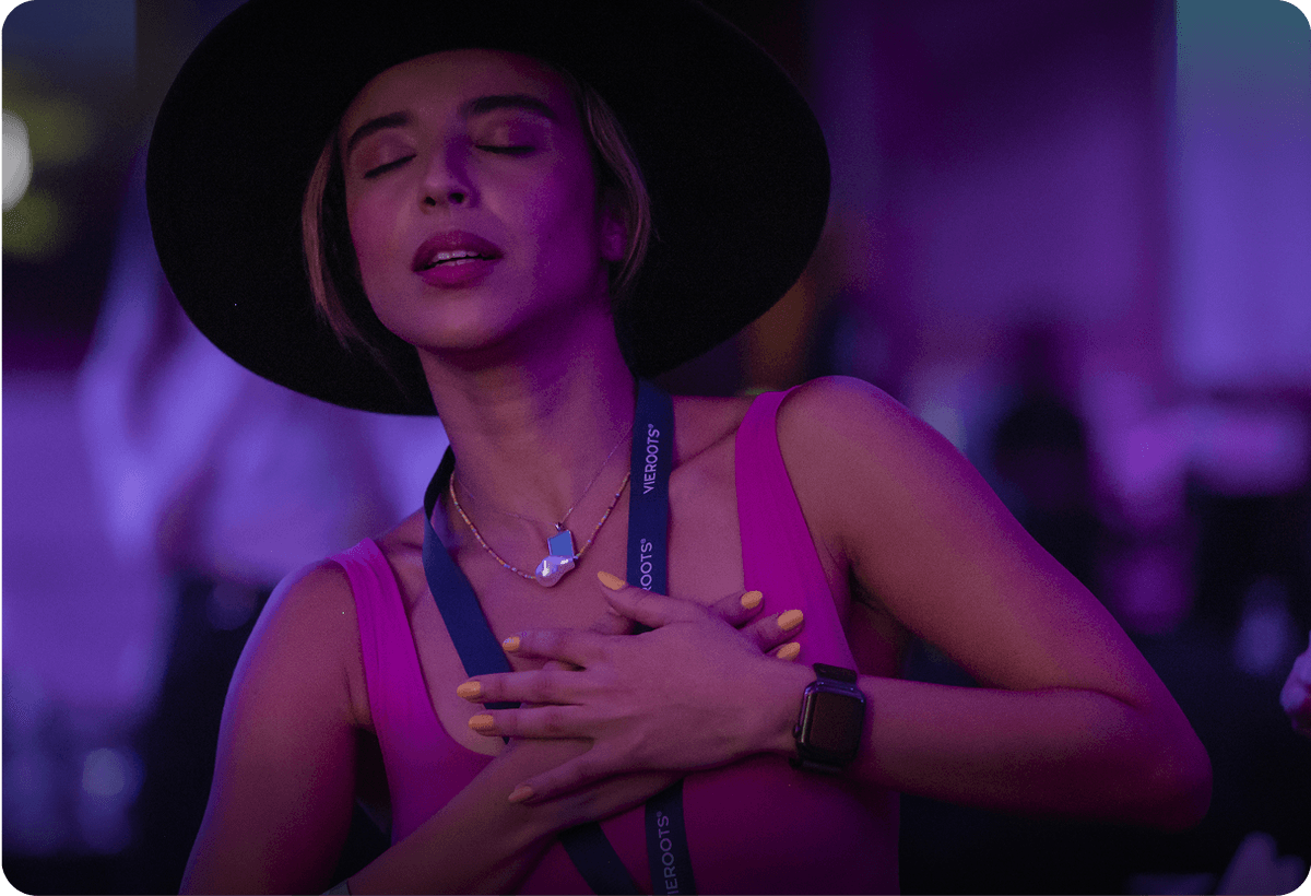 A woman touching her heart.